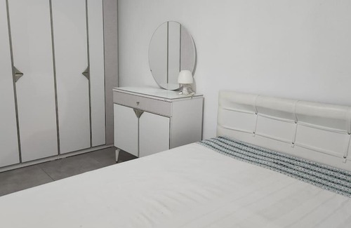 Kadıkalesi Mh. Apartment | Idyllic Garden Apartment by the Sea with Family-Friendly Amenities
