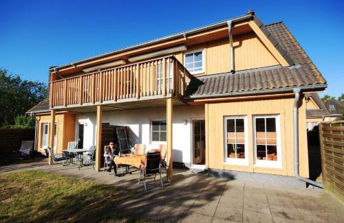 Koserow Apartment | Inviting Koserow Retreat with Garden, Terrace & Grill