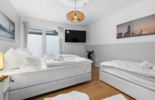 Rhein-Erft-Kreis District Apartment | Stylish Hotel Near Köln Center: Family-Friendly & Rated 9.4