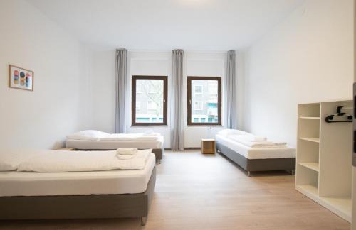 Neuenkamp Apartment | RAJ Living: 4 Room Apartments Near Messe DUS
