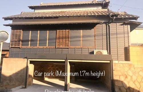 Obu Apartment | Experience Tomo's INN: A 9/10 Guest Favorite Escape