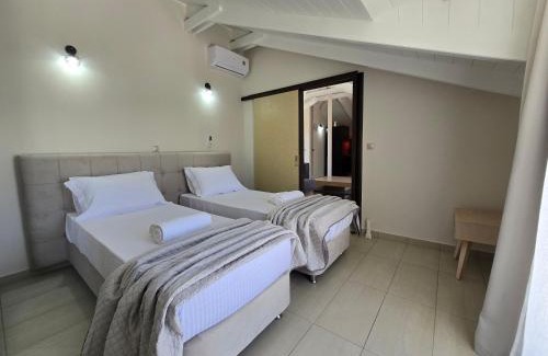 Vasilikos Apartment | Oceanfront Tomorrow Attic Apartment - Rated 10/10 by Guests