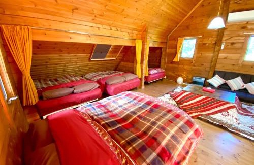 Shiraoi House | Inviting Tomy's Log House - Perfect for Families & Pets