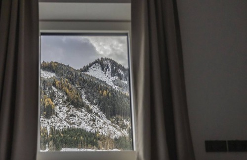 Woerth Apartment | Discover Riverside Rauris: Family-Friendly & Pet Welcoming