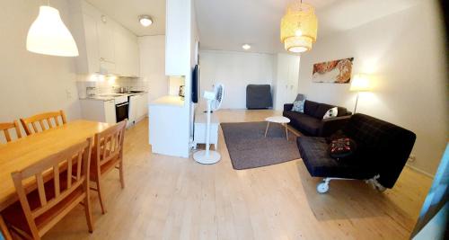 Itainen District Apartment | Elevated Retreat with Balcony & Eco-Friendly Amenities
