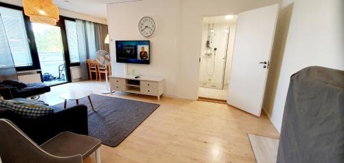 Itainen District Apartment | Elevated Retreat with Balcony & Eco-Friendly Amenities