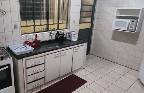 Regiao Urbana Homogenea IV Apartment | Cozy 2-Bedroom Apartment with Parking and Spa Amenities