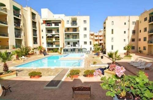 Bugibba Apartment | Top Floor Apartment with Pool Near All Amenities & Pets Welcome