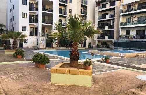 Bugibba Apartment | Top Floor Apartment with Pool Near All Amenities & Pets Welcome