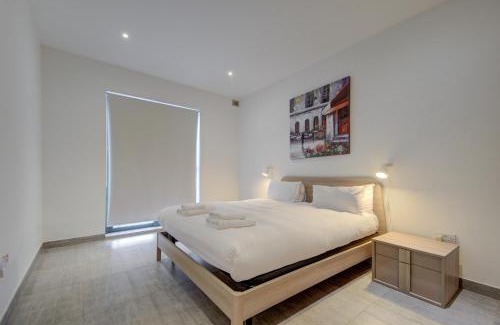 Bugibba Apartment | Top Floor Apartment with Pool Near All Amenities & Pets Welcome