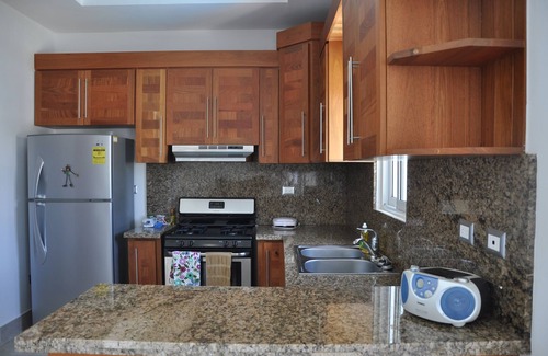La Esplanada Condo | Elegant Penthouse with Pool in the Heart of Sosua