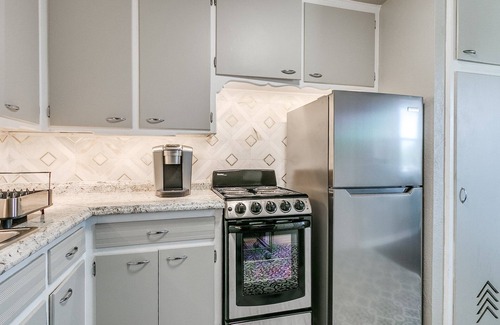 Norman House | Top Level Charming Townhome with 1 bedroom as close to campus as you can get!