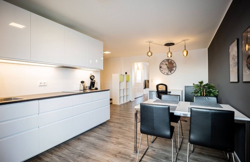 Kempten Apartment | Prime Location Featuring Unique Cow Design & Great Amenities