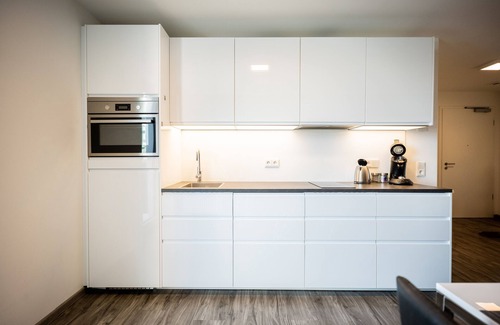 Kempten Apartment | Prime Location Featuring Unique Cow Design & Great Amenities