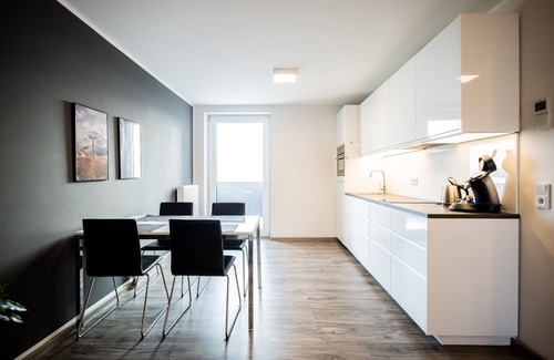 Kempten Apartment | Prime Location Featuring Unique Cow Design & Great Amenities