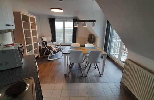 Westerdeichstrich Apartment | Modern Retreat with Ocean View & Breakfast Near the Beach