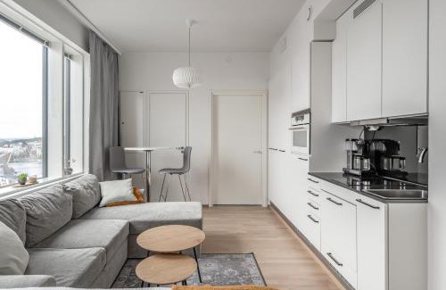 Tampere Apartment | Topaasi - Nokia Arena Apartments above the skies by Come in!