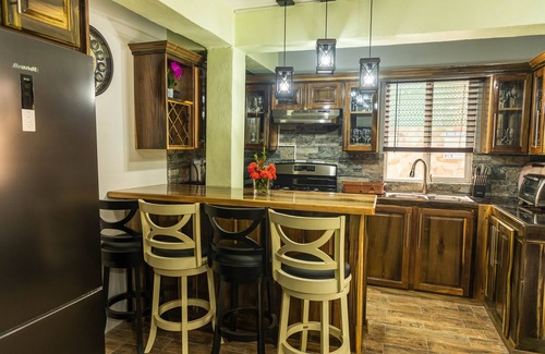 Soufriere Condo | Premier Poolside Retreat at Topaz Apartment Villas