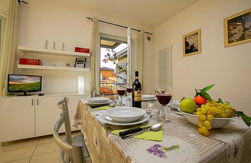 Torbole sul Garda Apartment | Relax in Torbole: Pool & Balcony Apartment Retreat