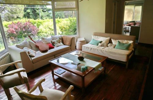 Golondrinas House | Experience Torcazas: Family-Friendly 4-Star Retreat