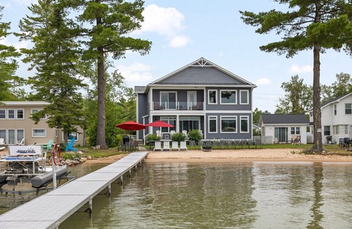 Rapid City House | Unforgettable Torch Lake Sandbar Retreat with Pool & Views