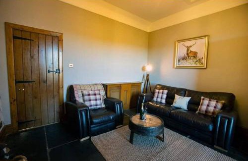 Halkirk House | Torran Cottage: Exclusive Views and Relaxing Hot Tub Retreat