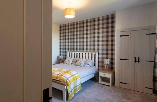 Halkirk House | Torran Cottage: Exclusive Views and Relaxing Hot Tub Retreat