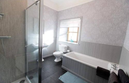 Halkirk House | Torran Cottage: Exclusive Views and Relaxing Hot Tub Retreat
