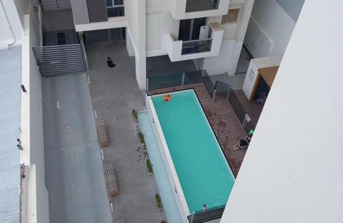 Puerto Madryn Apartment | Torre 2: Oceanfront Relaxation with a Pool and Hot Tub