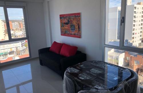 Puerto Madryn Apartment | Torre 2: Oceanfront Relaxation with a Pool and Hot Tub