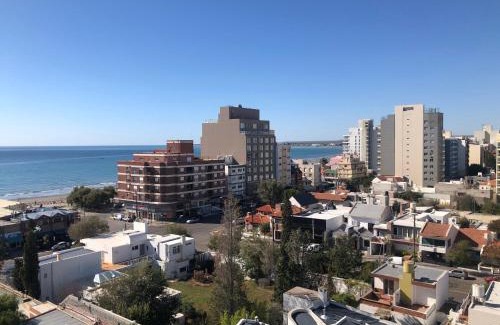Puerto Madryn Apartment | Torre 2: Oceanfront Relaxation with a Pool and Hot Tub