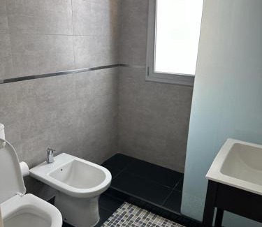 Puerto Madryn Apartment | Torre 2: Oceanfront Relaxation with a Pool and Hot Tub