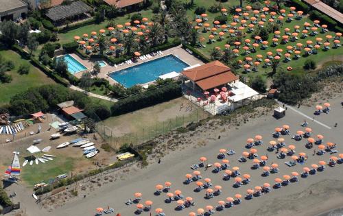 Tarquinia Hotel | Relax at Torre Del Sole with Ocean Views and Pool Access