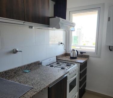 Rio Cuarto Apartment | Tranquil TORRE MAFALDA: Poolside Oceanfront Retreat