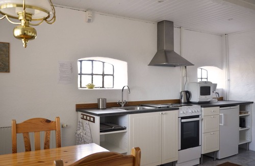 Simrishamn Bed & Breakfast | Exceptional Torsborgs Gård with Breakfast & Kitchen Amenities