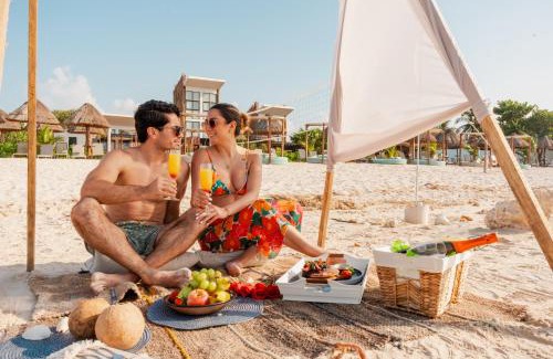 Celestun Hotel | Relax at Tótem Beach Club: Oceanfront Paradise Awaits
