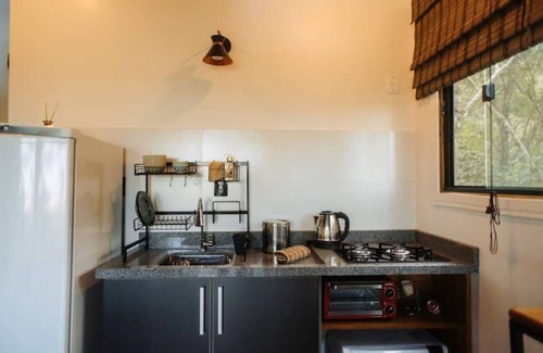 Garopaba House | Scenic Tourmaline Studio with Ocean Views and Spa Amenities