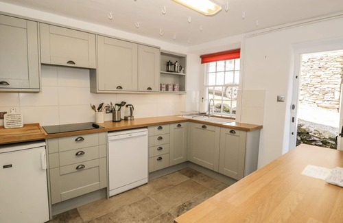 Penny Bridge Cottage | Family-Friendly Town End Farmhouse with Cozy Open Fire