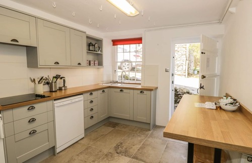 Penny Bridge Cottage | Family-Friendly Town End Farmhouse with Cozy Open Fire