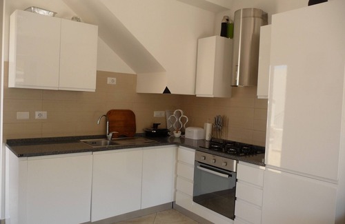 Marina di Zambrone Villa | Scenic Townhouse Steps from the Beach with Oceanfront Pool