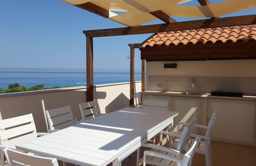 Marina di Zambrone Villa | Scenic Townhouse Steps from the Beach with Oceanfront Pool