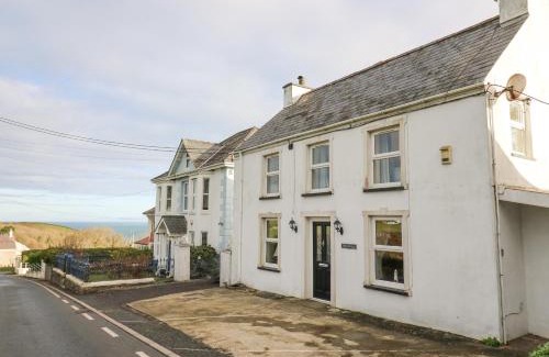 New Quay House | Experience Towyn Hall: Family & Pet-Friendly Retreat