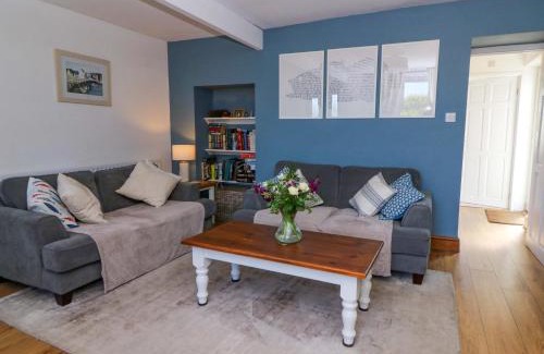 New Quay House | Experience Towyn Hall: Family & Pet-Friendly Retreat