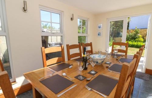 New Quay House | Experience Towyn Hall: Family & Pet-Friendly Retreat