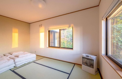 Toyako Apartment | Toya Cliff House Modern Kominka (Japanese style house) with spectacular ocean.