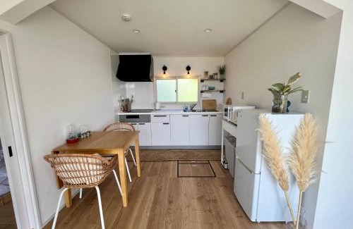 Toya House | Experience Toya Lakeview Cottage: Steps to the Lakeshore