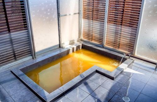 Sobetsu Apartment | Cozy TOYA ONSEN VILLA: Family-Friendly with Hot Tub Bliss