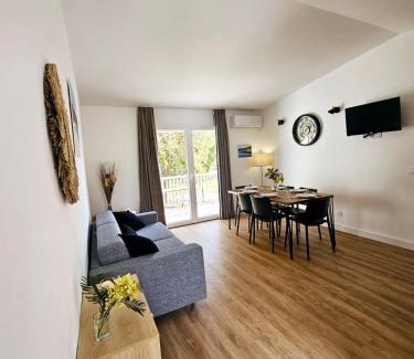 Lecci Apartment | Beautiful Fiori Di Cala Rossa Apartment with Oceanfront Pool