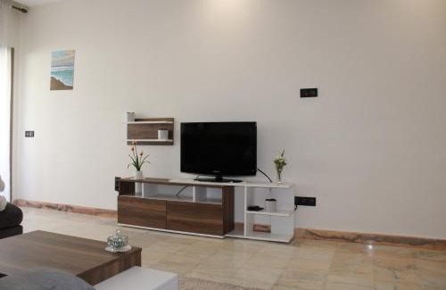 El Mansouria Apartment | Beautiful Garden Apartment Steps from Les Sablettes Beach