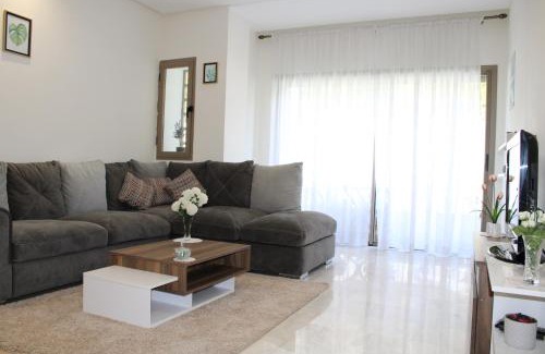 El Mansouria Apartment | Beautiful Garden Apartment Steps from Les Sablettes Beach